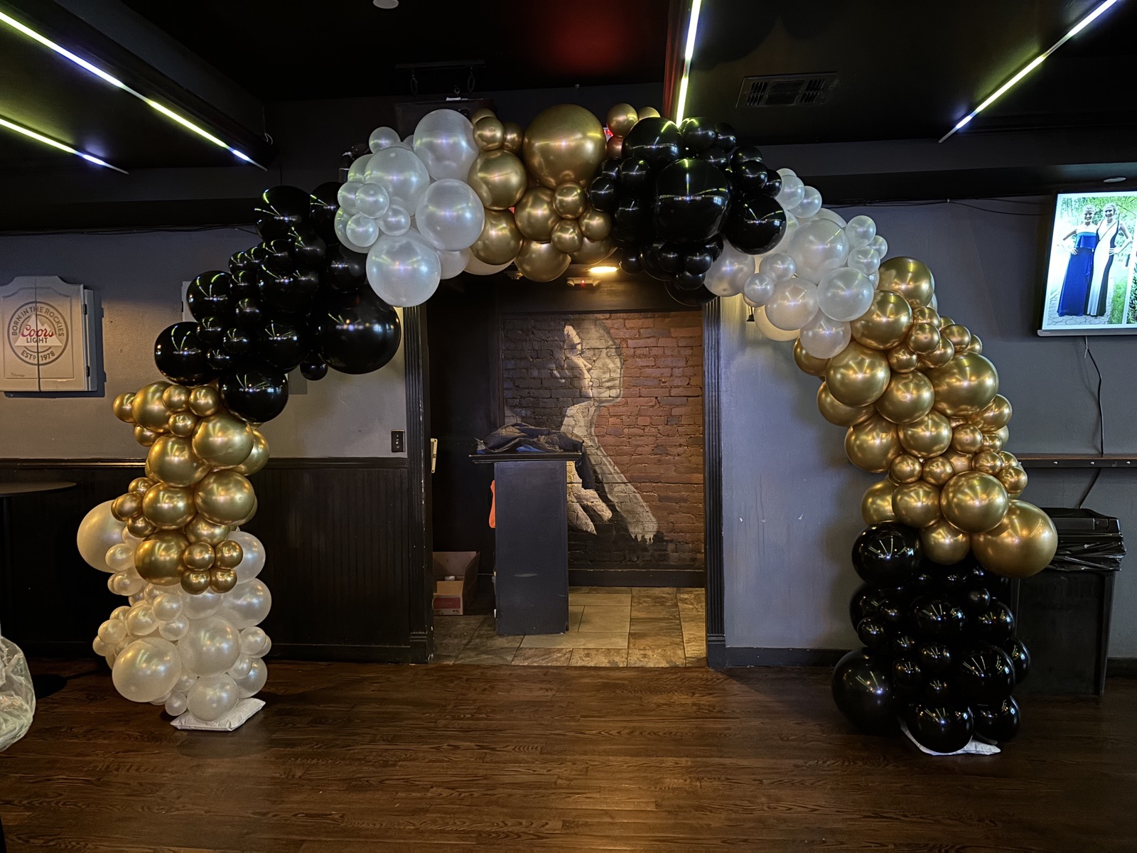 Black and chrome gold balloon arch
